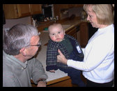 Uncle Mike and Aunt Bette McQuade with Logan.