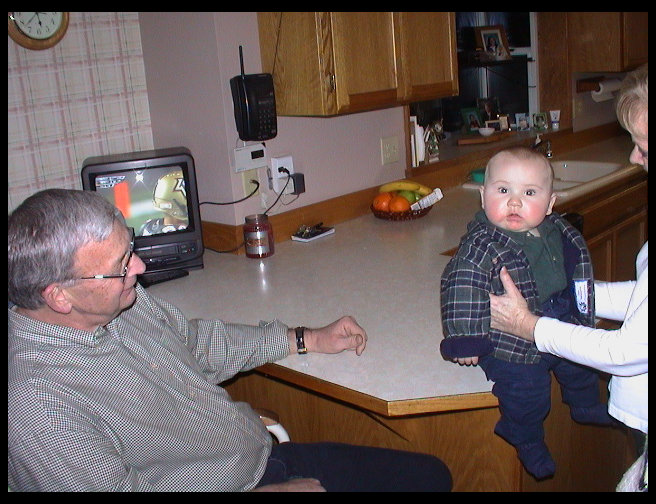 Another shot of Logan with Aunt Bette and Uncle Mike.
