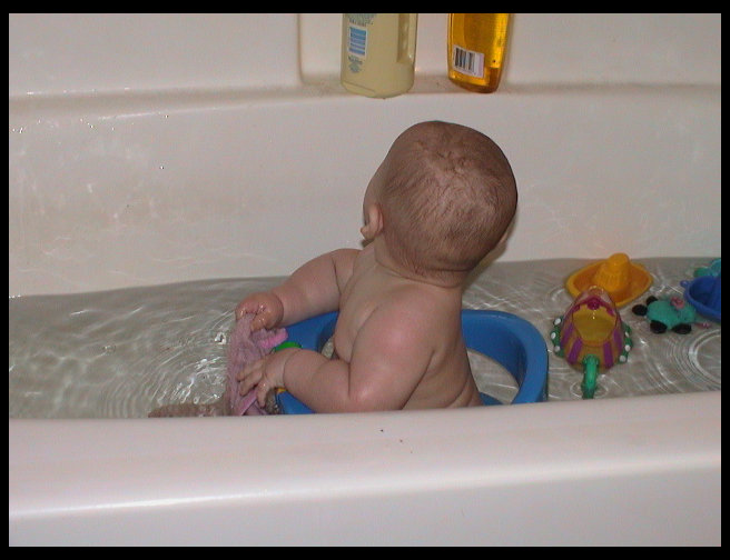 Logan taking a bath. One of his favorite times.