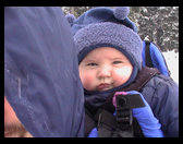 There is Logan on Daddy's back. He liked the snow.