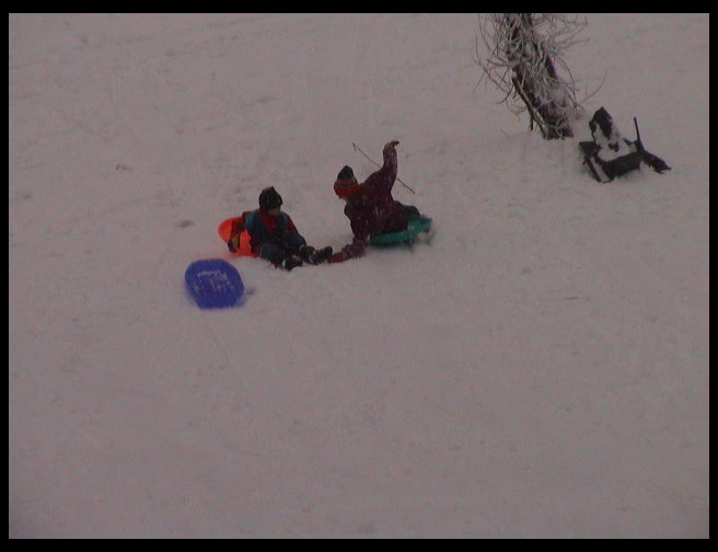 Jennifer and Kaleb at the bottom of the hill.