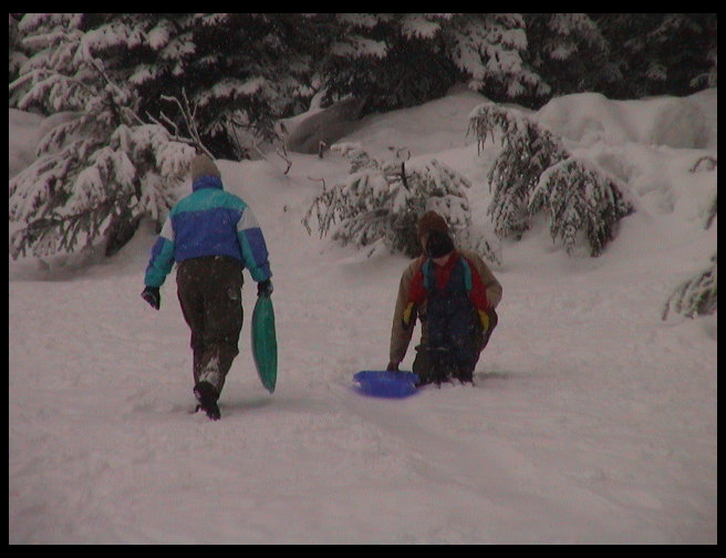 There is Kari and Kaleb getting ready to slide.