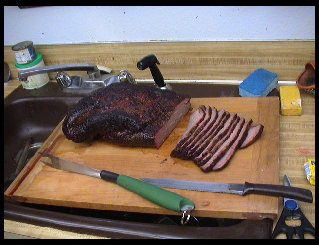 Our master chef Timm w/ his first brisket.