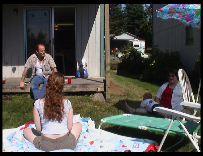 Eric on porch, Denise and Logan and I.