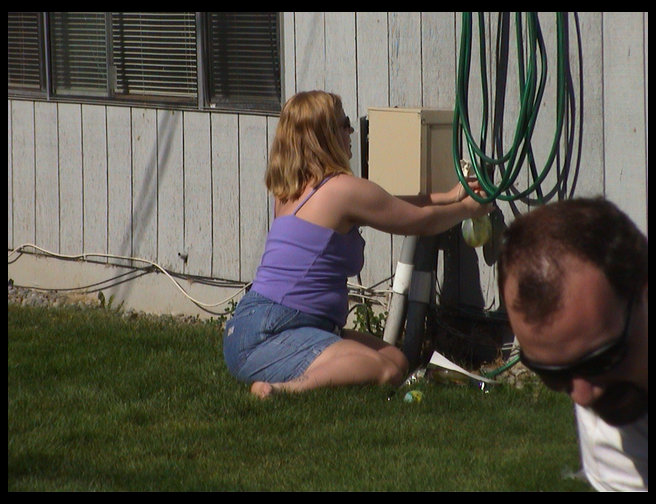 Debbie filling up water balloons, and Pasha's Head.