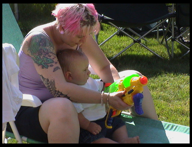 Logan and his first squirt gun.