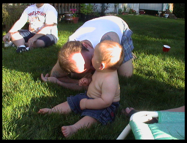 Eric being silly with Logan.