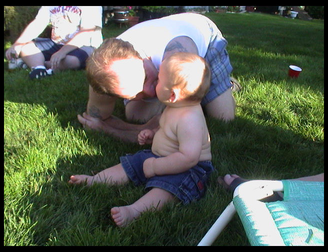 Now...Logan is giving kisses.