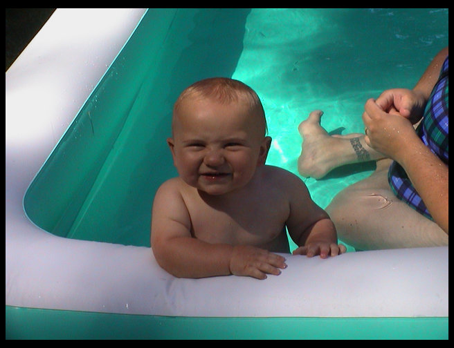 Logan and me in the swimming pool.