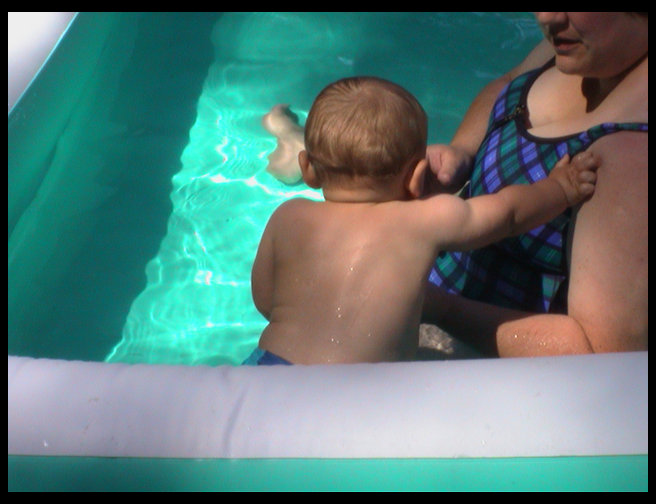 Logan and I still in the pool.