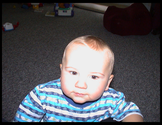 Logan really likes to have his picture taken.