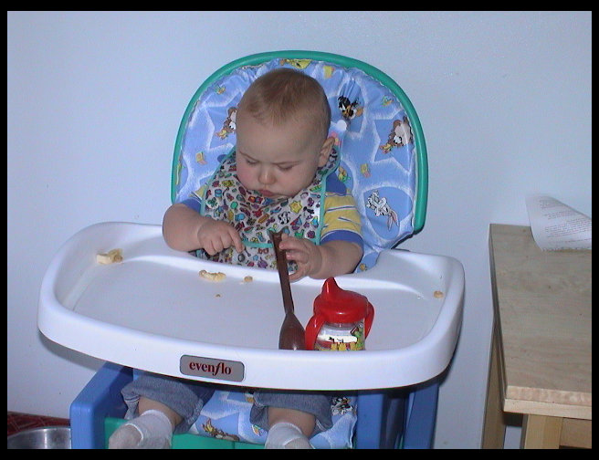 Logan discovers he has a pocket on his bib.