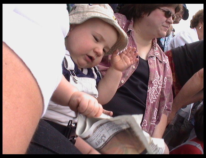 Logan and mom enjoying the parade.