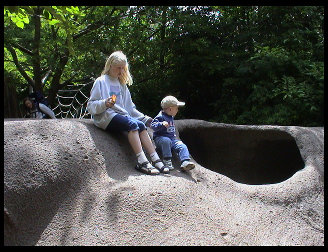 Lisa Marie and Walter on a structure at the Zoo.