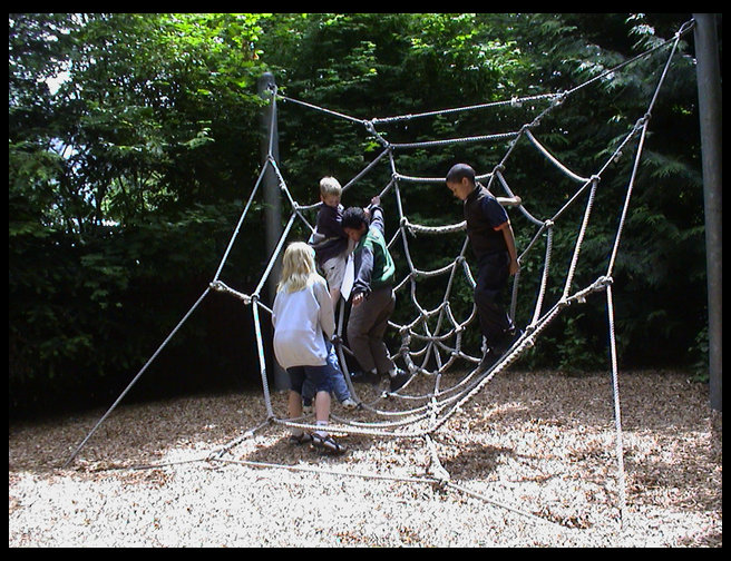 Climbing on the rope spider web.