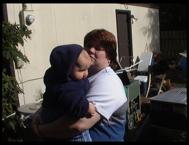 Logan and mommy outside on a nice March day.