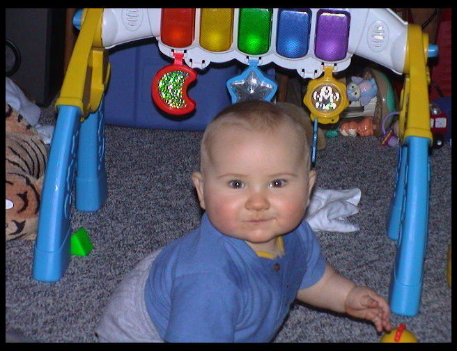 Playing with his toys.
