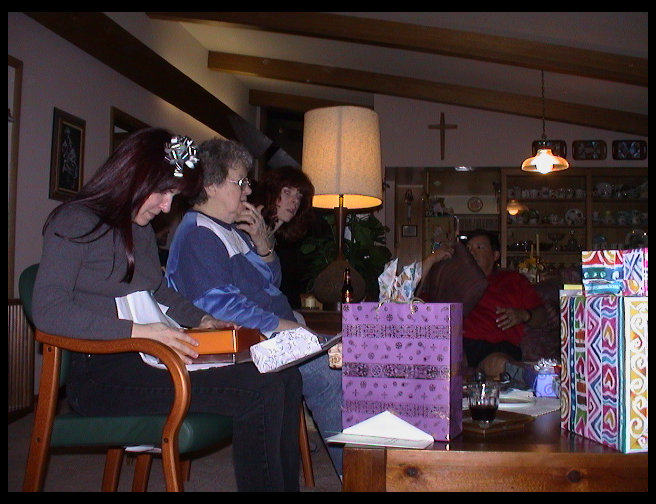 Grandma Zoe opening presents.