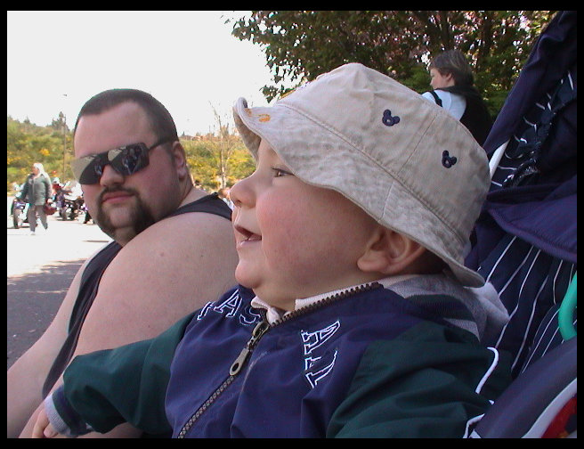 Logan and daddy haning out watching a show.