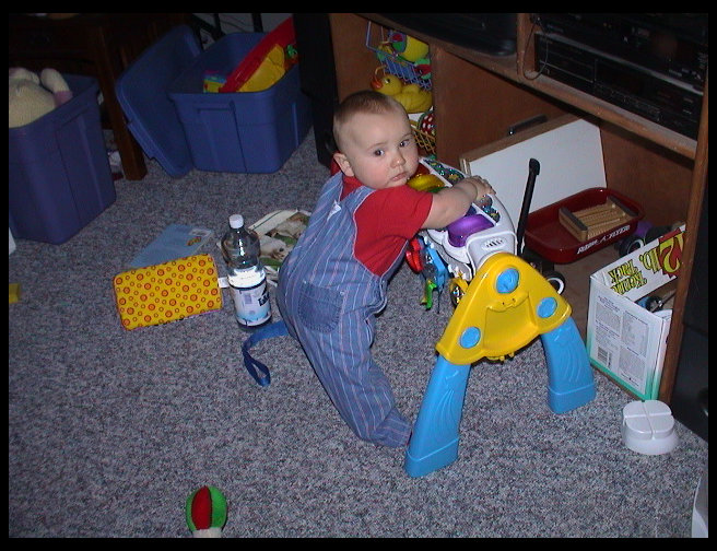 There he is standing up at this piano.