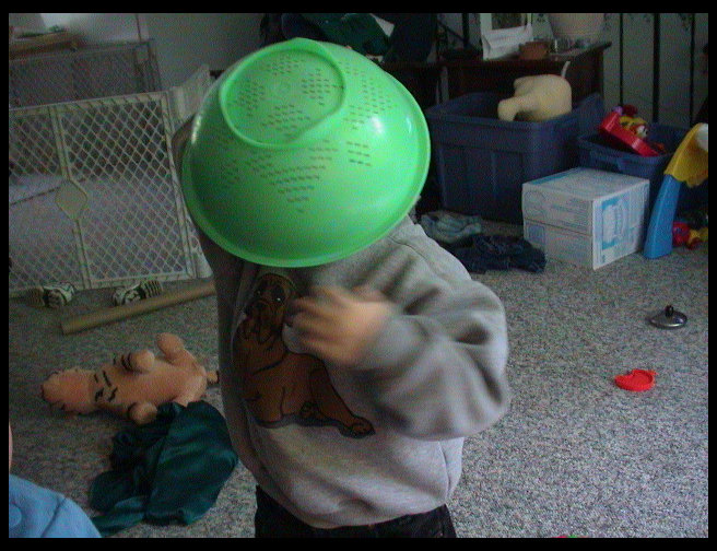 Hey who is under that colander?