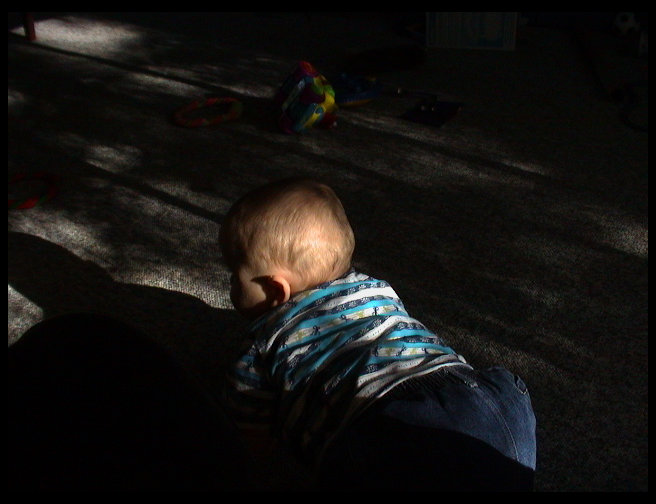 Now he is crawling away from the camera.