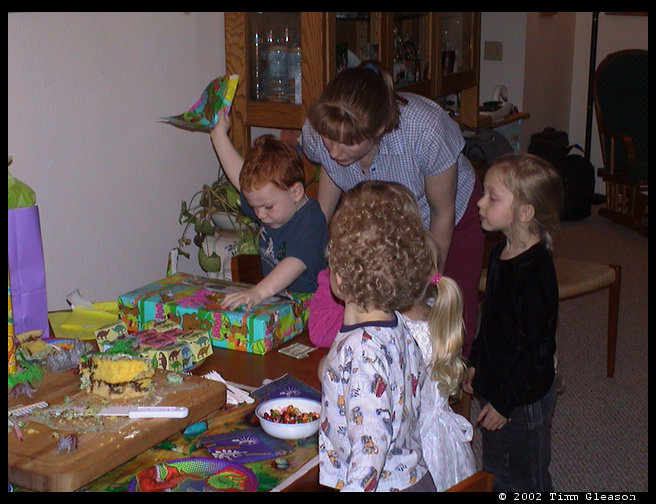 Present opening started on the table.