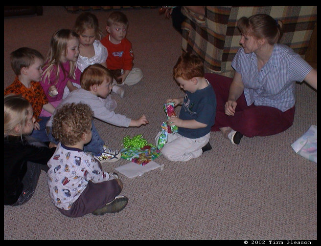 Opening another present from Logan.