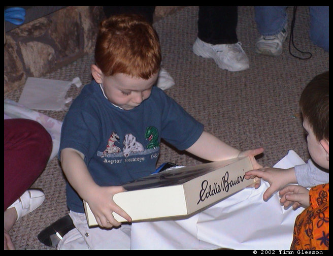Walt doing a great job at opening his presents.