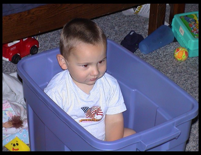 Logan in a box.