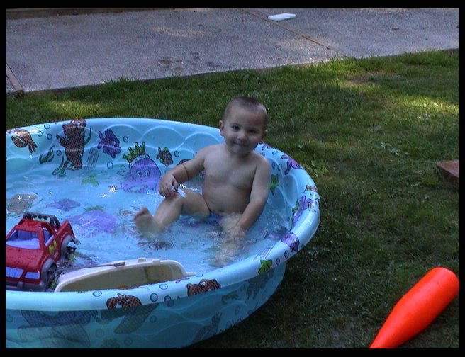 Showing us his owie.