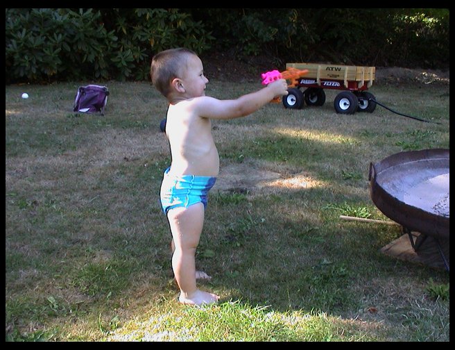 Logan wth squirt gun.