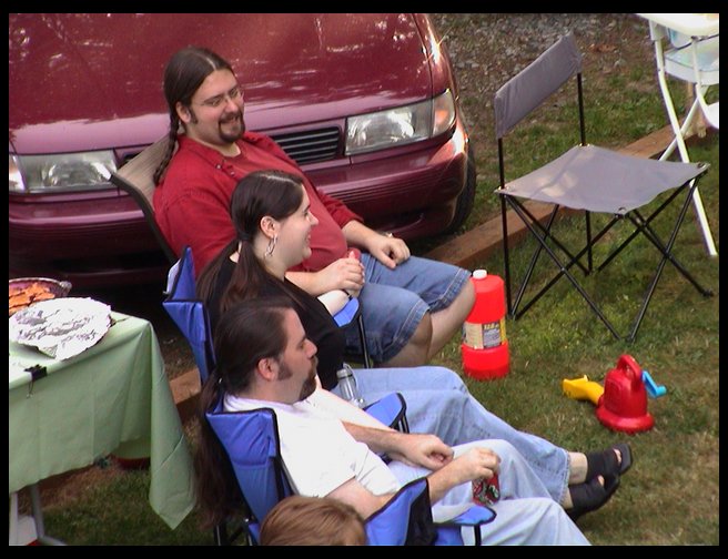 Larry, September and Josh enjoying everyone else.