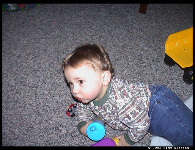 Logan was posing for a picture Walter was helping mommy take.