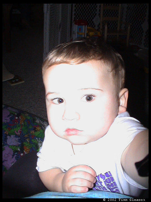 Reaching for the camera.