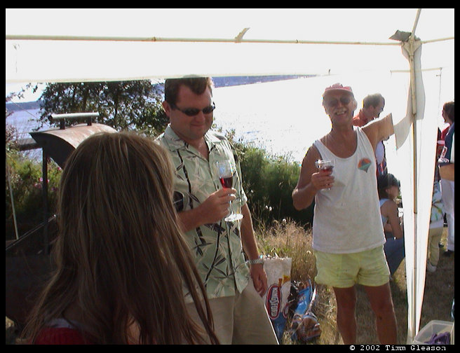 Heather, Jeff and Jeff's stepdad Richard toasting the marriage.