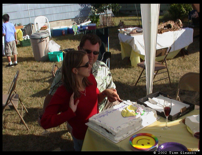 Cutting the congratulatory cake.