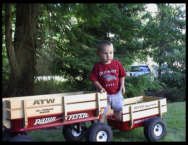 Logan in his wagon!