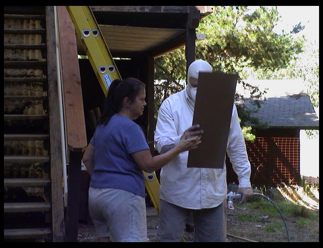 Mom (Zoe) holding a test board for Thom.  