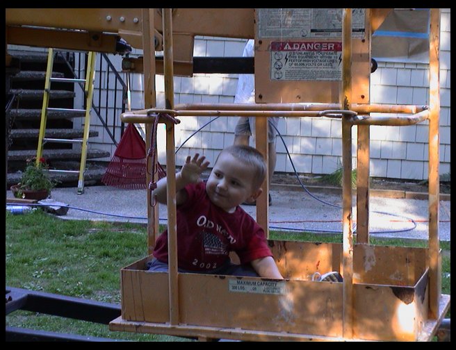 Logan having a great time in the boom.  