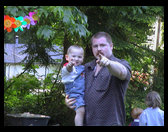 Uncle Mark & Logan pointing at mommy.