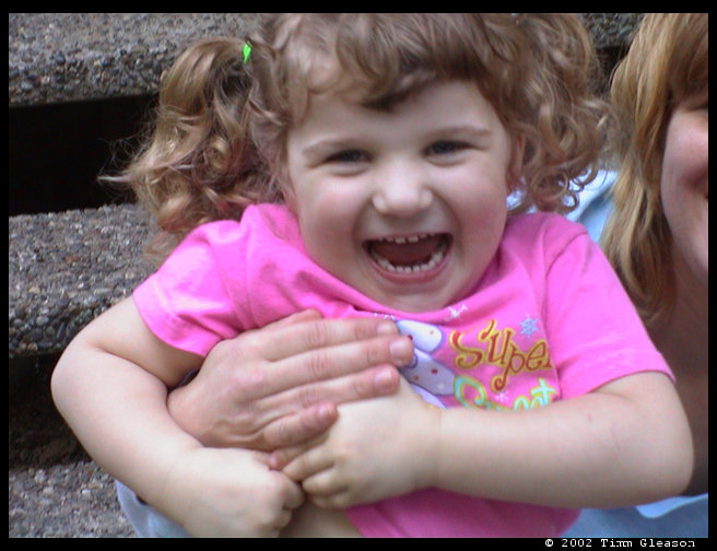 Maddie giggling like every little girl should.