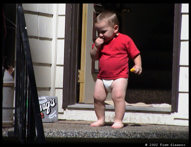 Logan coming out of the house to play.