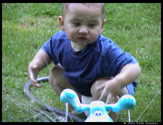 Logan in his Blue's Clues sprinkler