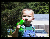 Logan and his squirt gun.