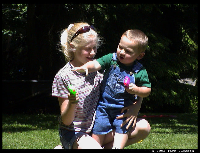 Logan, Lisa and squirt guns.