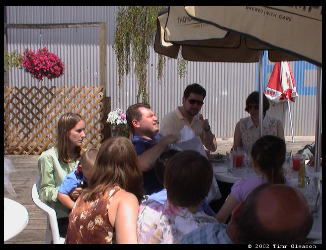 Logan in Heather's lap, Jeff, Dan & Susan.  
