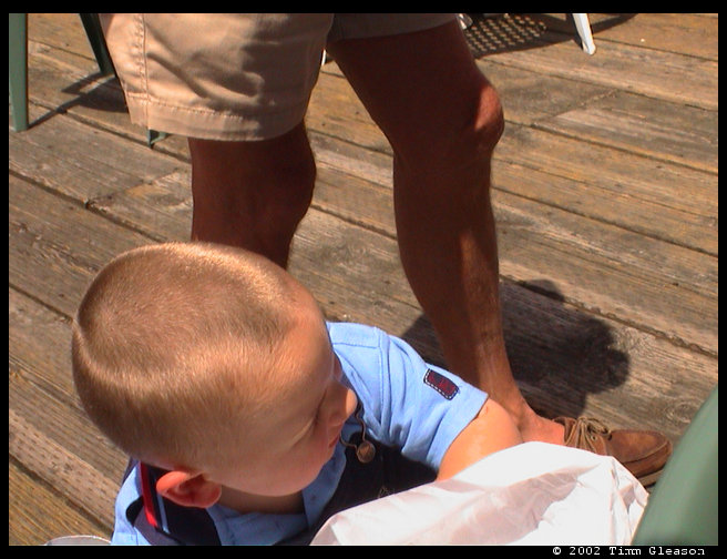 Logan digging in the gift bag.  