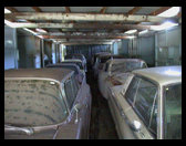 Cars in trailers at the property where part of the Harold LeMay collection is held.