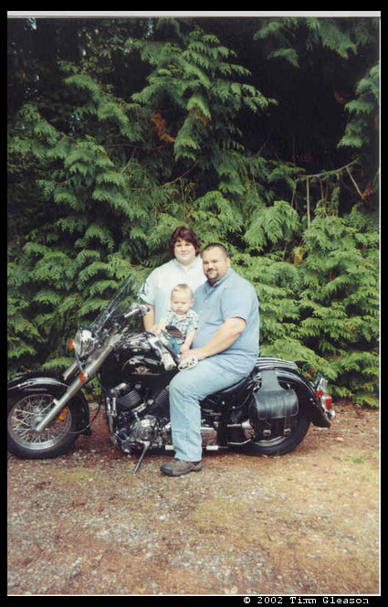 Sandra, Timm and Logan on Timm's bike.